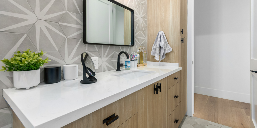 Hall Bathroom with Natural Wood Vanity and Accent Wall Tile