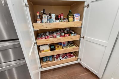 If your kitchen doesn't have space for a walk-in pantry, a pantry cabinet offers a great alternative!
