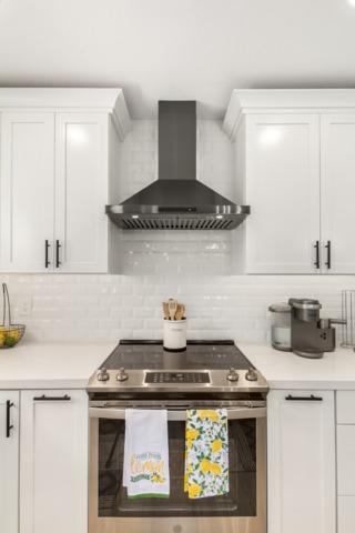 Tile Backsplash & Hood Vent