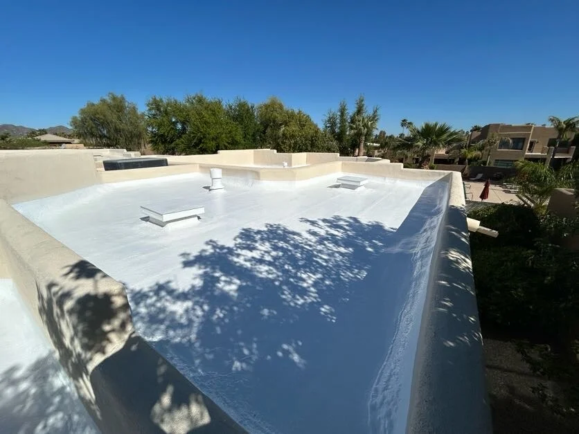 Arizona home roof during fall maintenance with clean gutters and inspected shingles