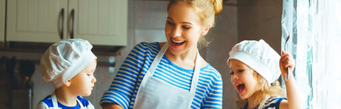 Mom and kids cooking in the kitchen
