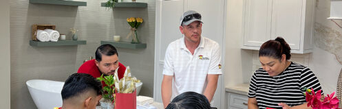 Travek remodeling team consulting a client on a home remodeling project