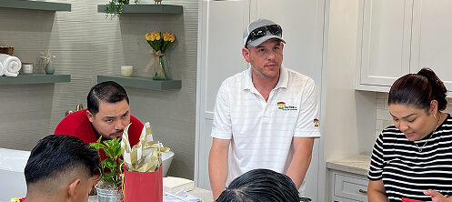 Travek remodeling team consulting a client on a home remodeling project